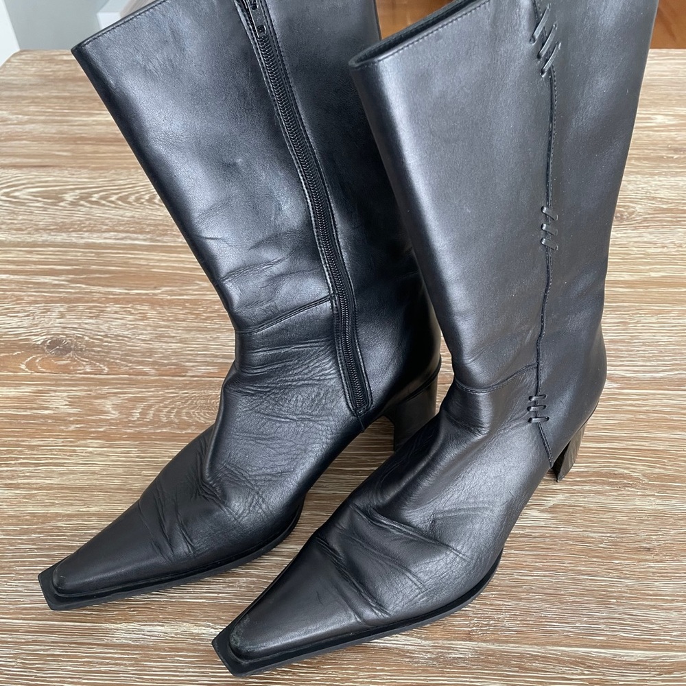 Black pointy toe leather boots from Europe.